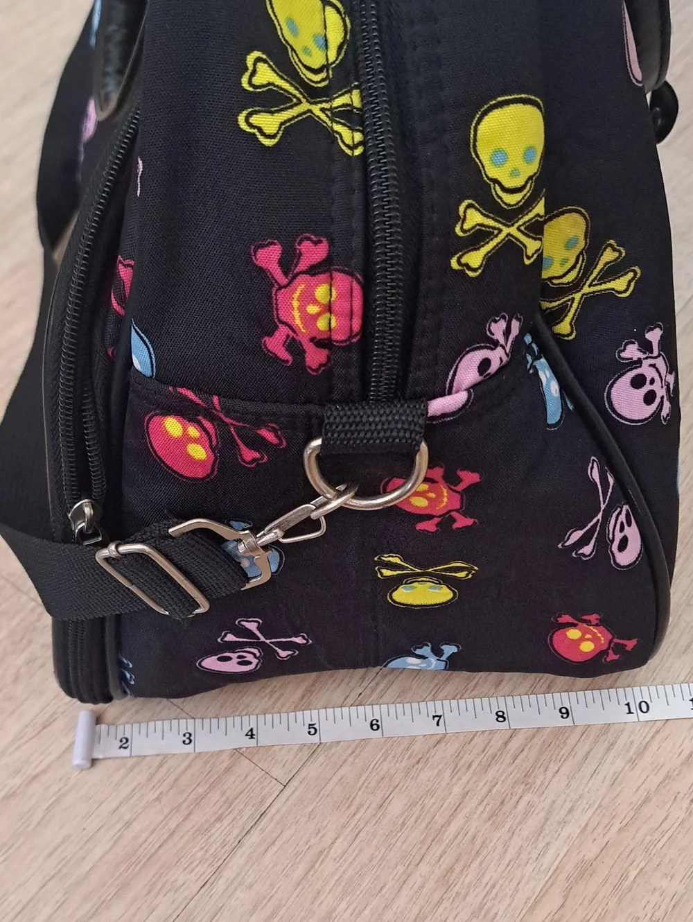 Skulls Design Black Duffel Bag with Multicolor Print